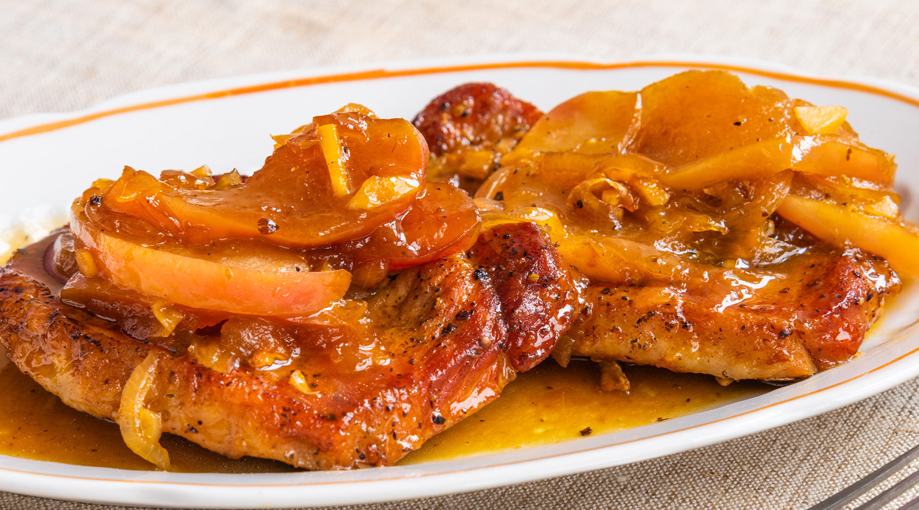 One-Pan Pork Chops with Apples and Cinnamon on a plate
