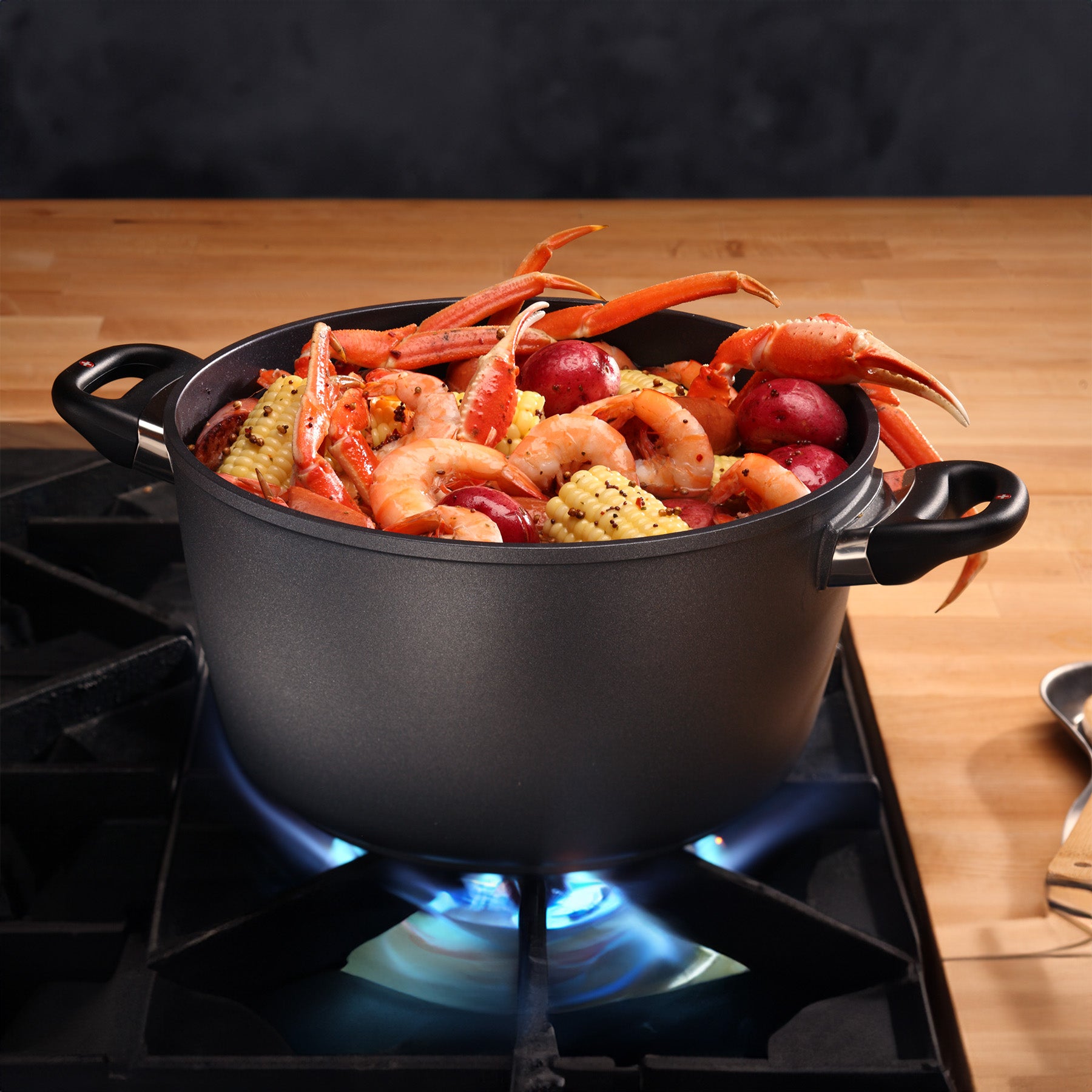 HD Nonstick Stock Pot in use on kitchen gas stove top