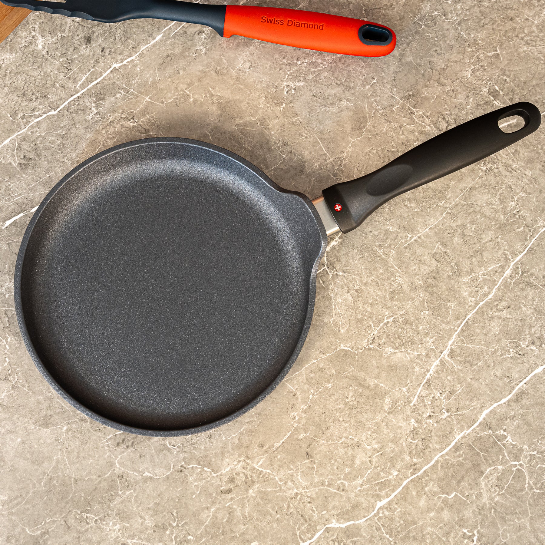 HD Nonstick Crepe Pan in use on kitchen counter