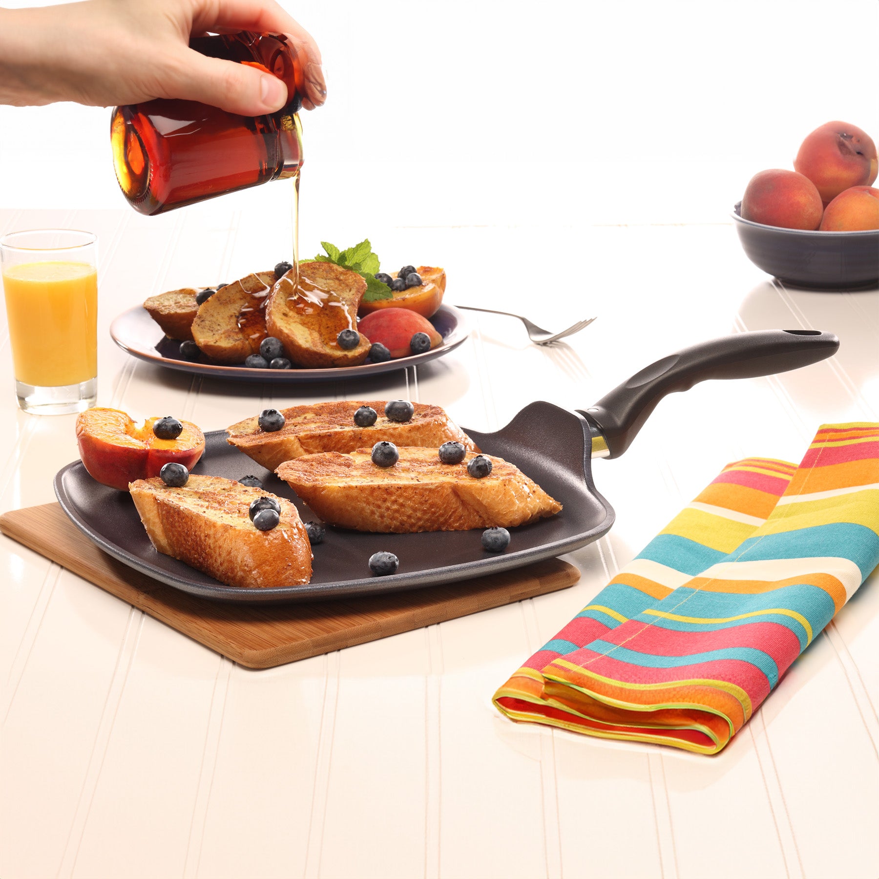 HD Nonstick 11" x 11" Square Griddle - Induction in use on dining room table