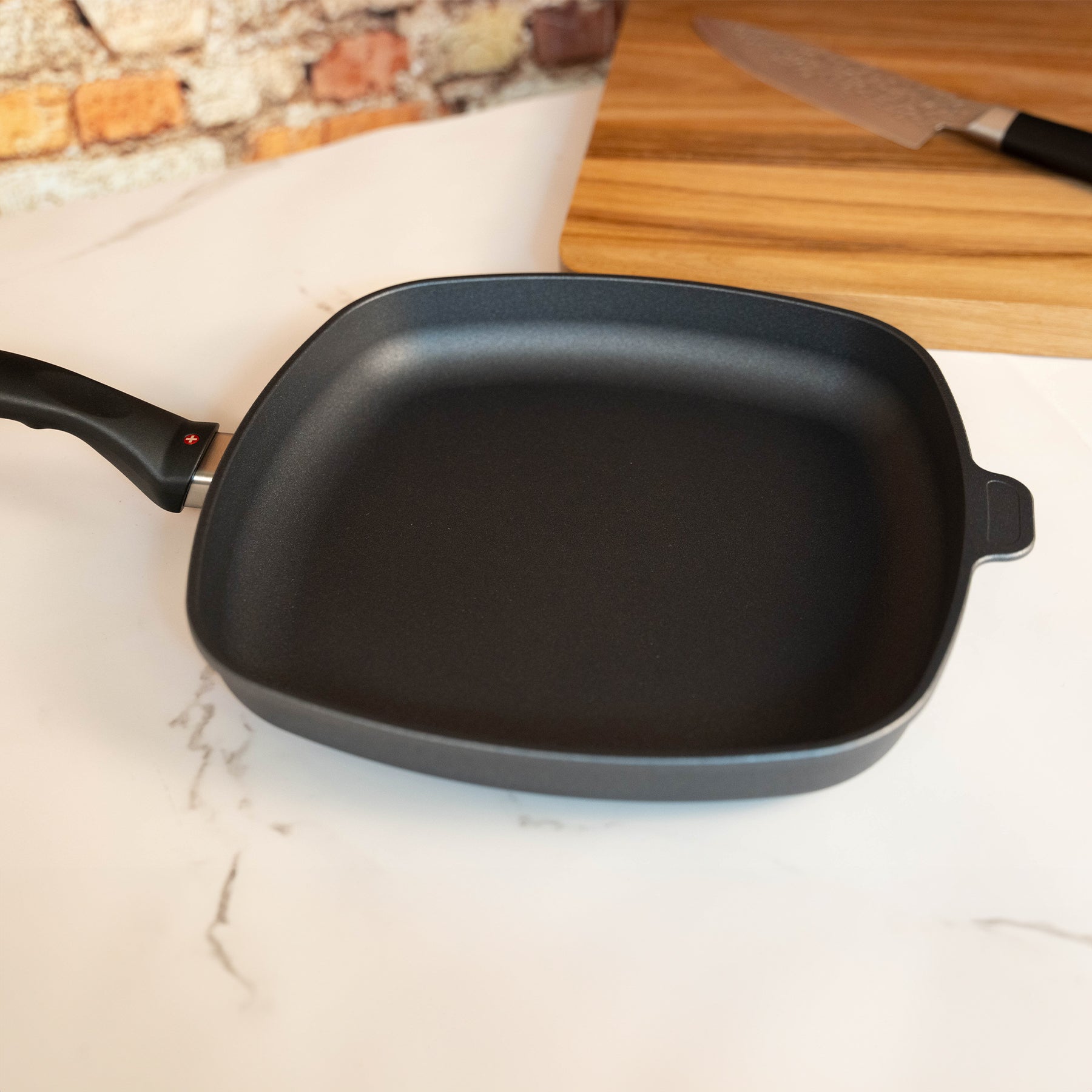 HD Nonstick 11" x 11" Square Fry Pan on kitchen counter with a side angled view