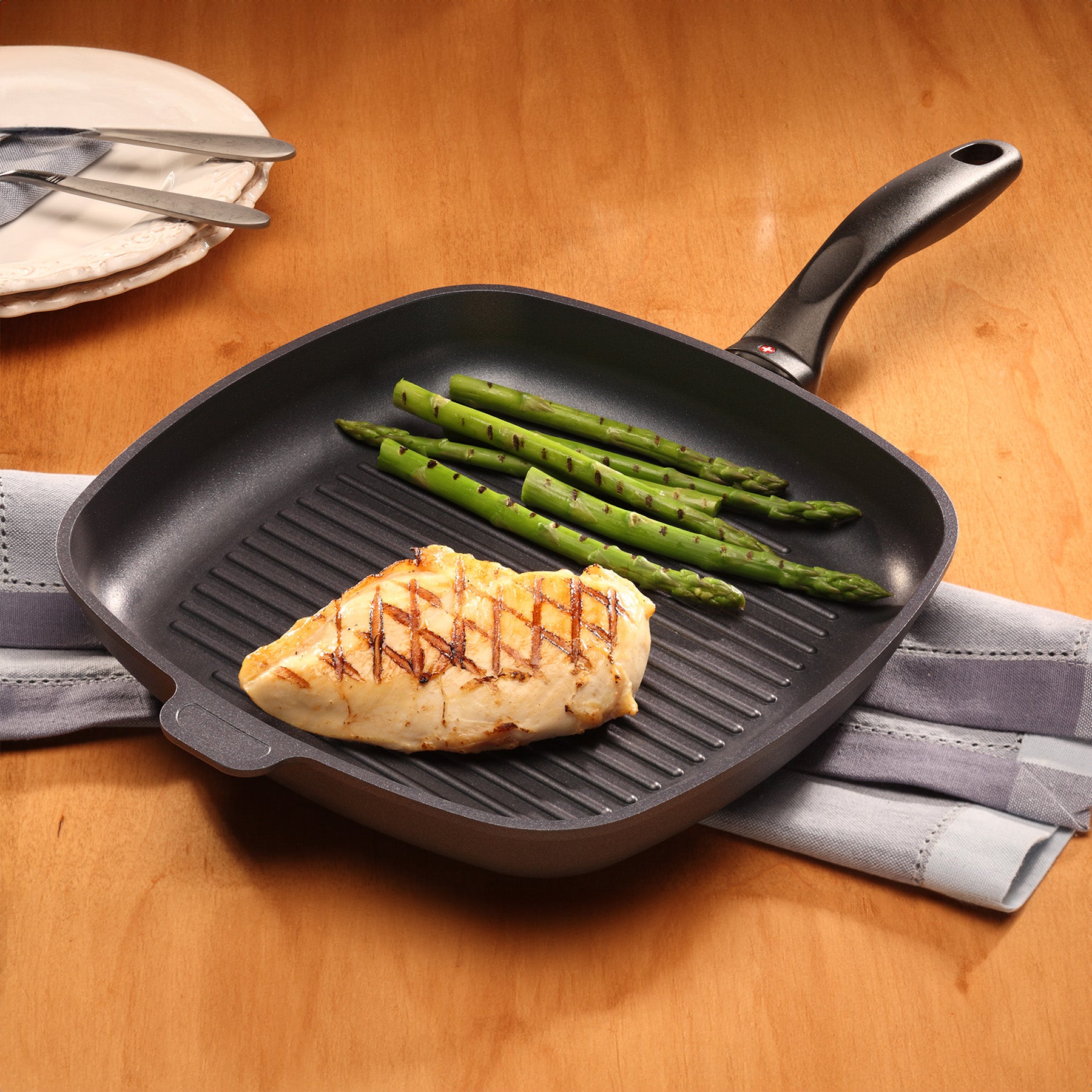 HD Nonstick 11" x 11" Square Grill Pan - Induction in use on dining room table