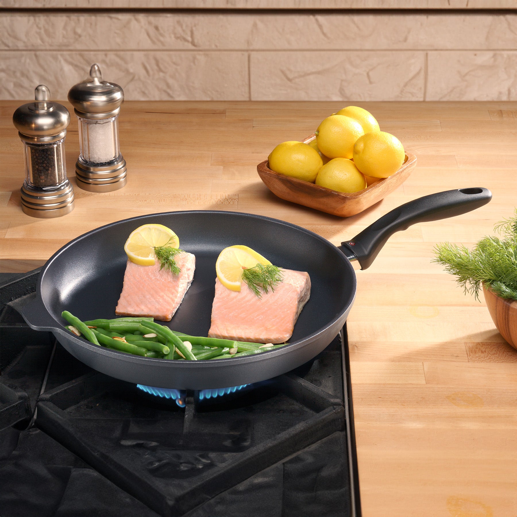 HD Nonstick Fry Pan in use on kitchen gas stove top