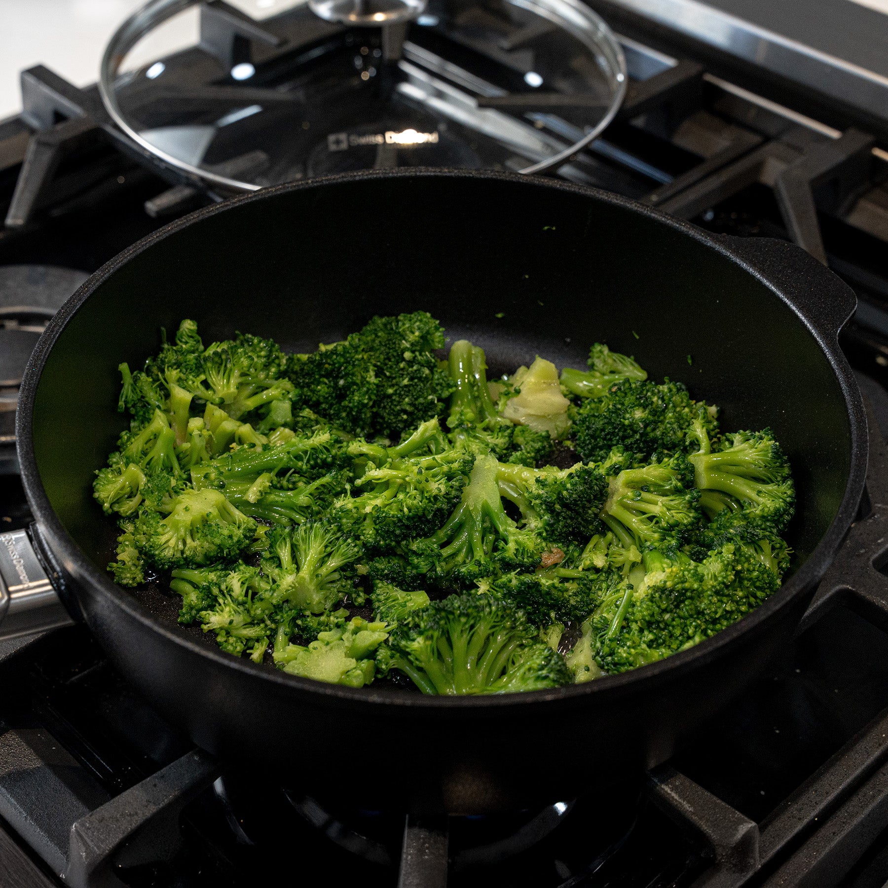 CHD Nonstick 3.8 qt Saute Pan with food inside on gas stove
