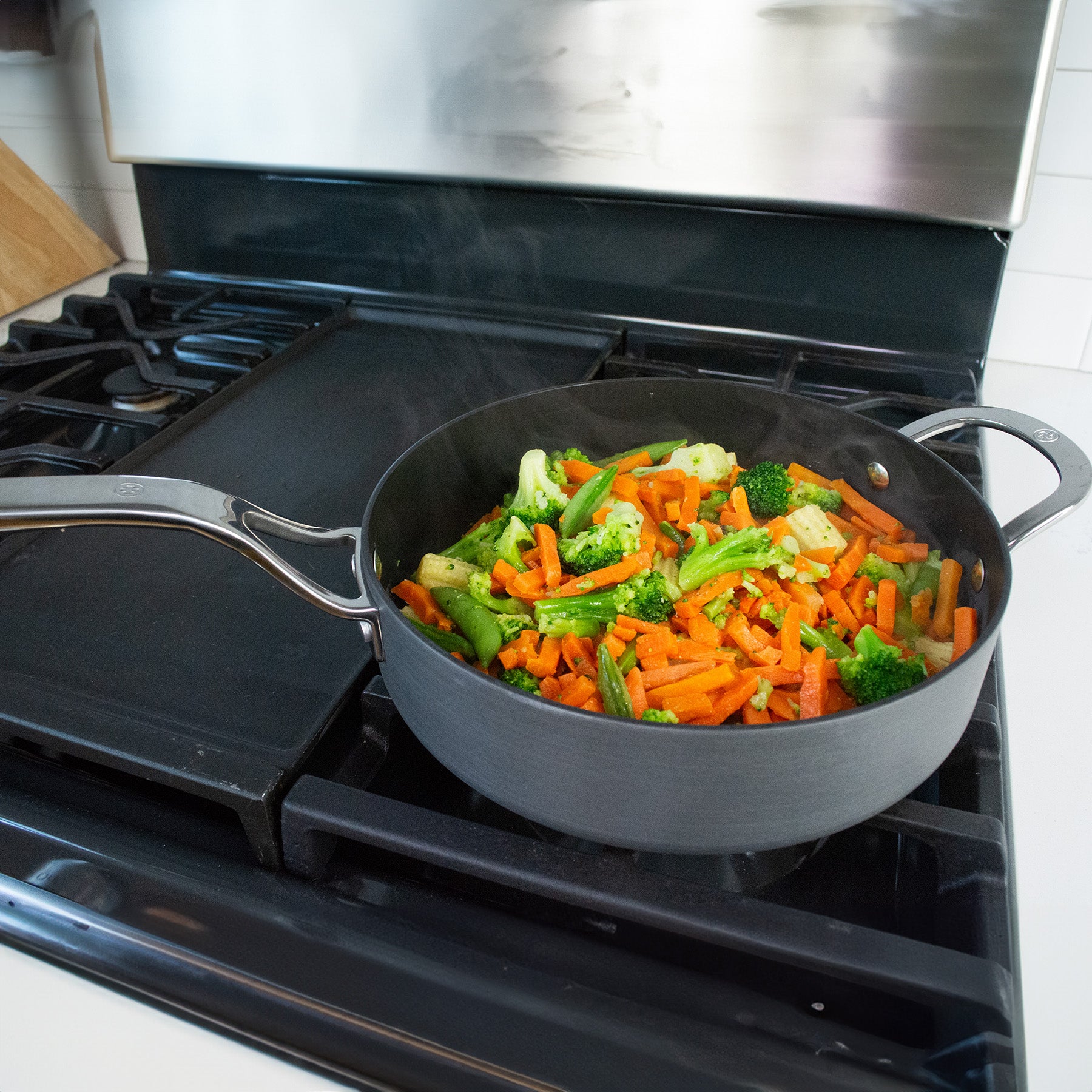 Hard Anodised Saute Pan - Induction in use on stove top