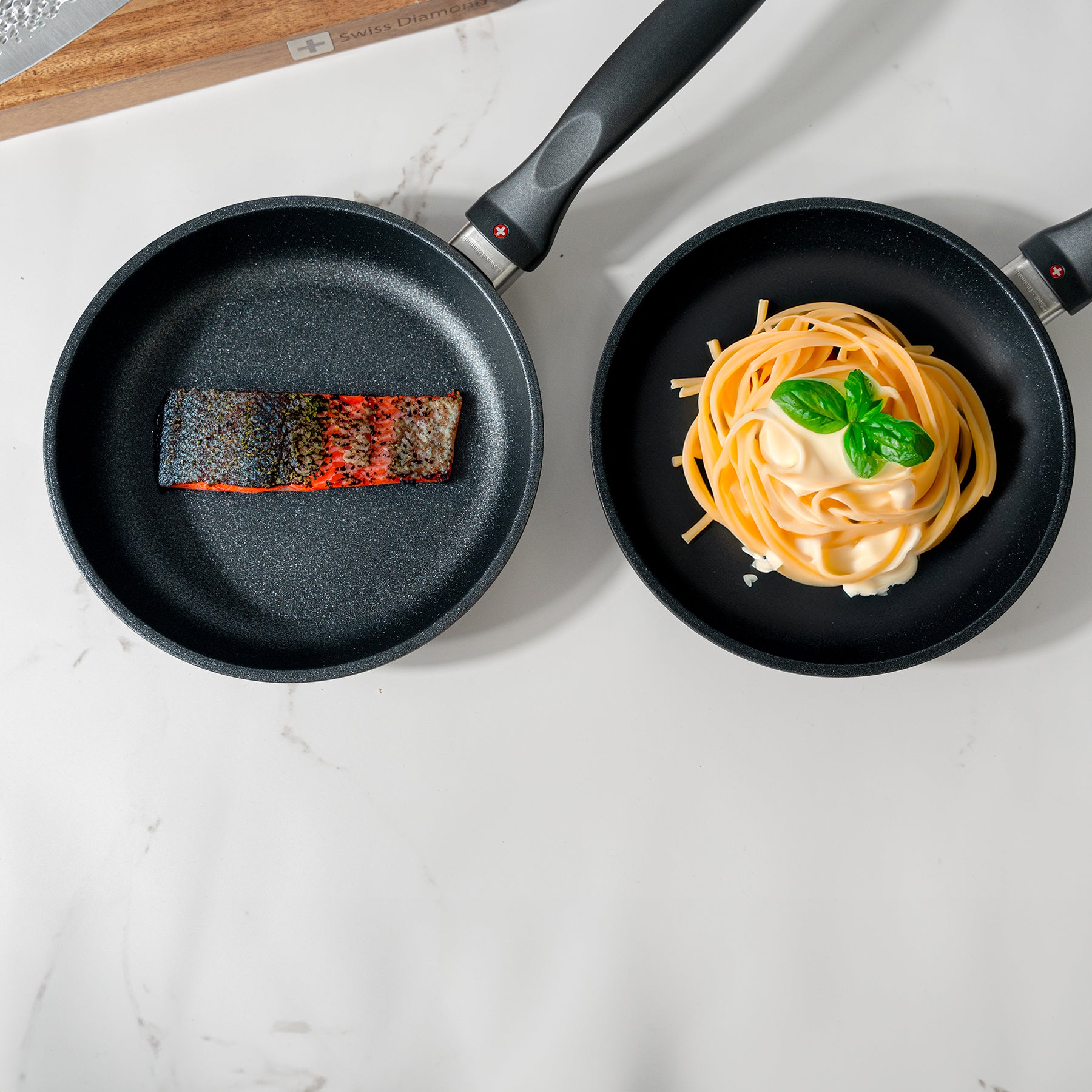 XD Nonstick 2-Piece 8" Fry Pan Set on kitchen counter with food inside pan