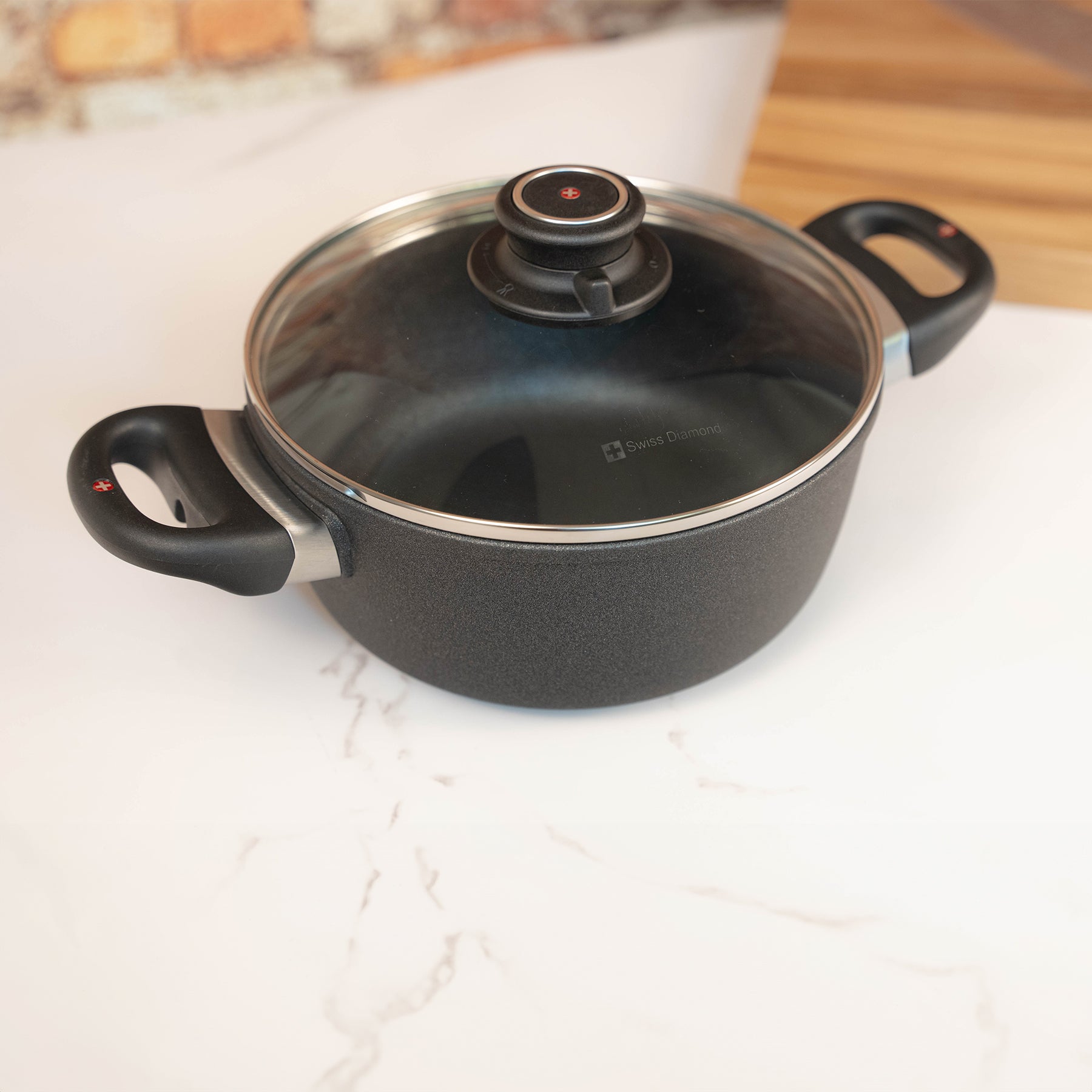 XD Nonstick Casserole with Glass Lid - Induction in use on kitchen countertop