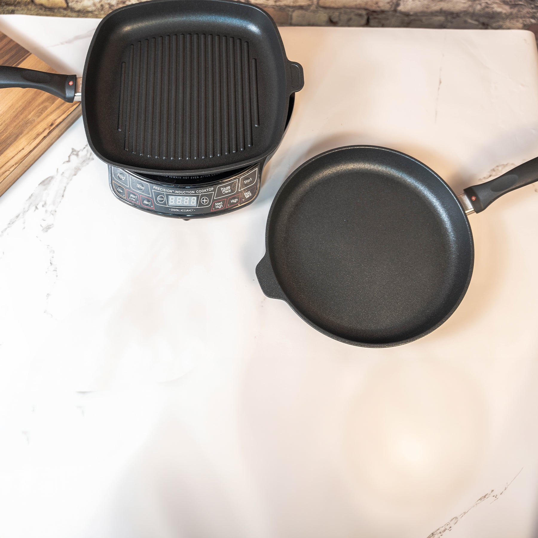 XD Nonstick 2-Piece Set - Fry Pan & Grill Pan - Induction in use on hot plate on kitchen counter