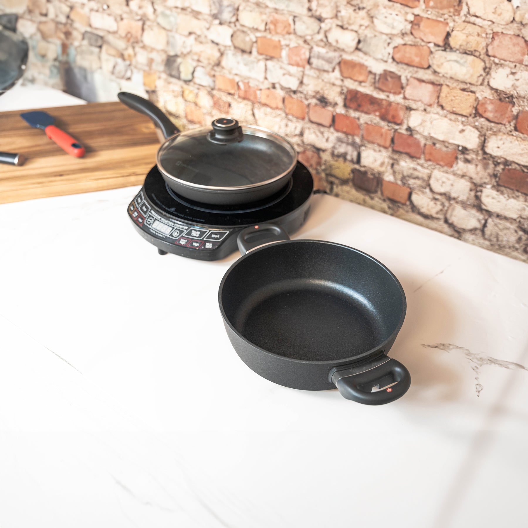XD Nonstick 3-Piece Set - Fry Pan & Casserole - Induction side view of pan on hot plate