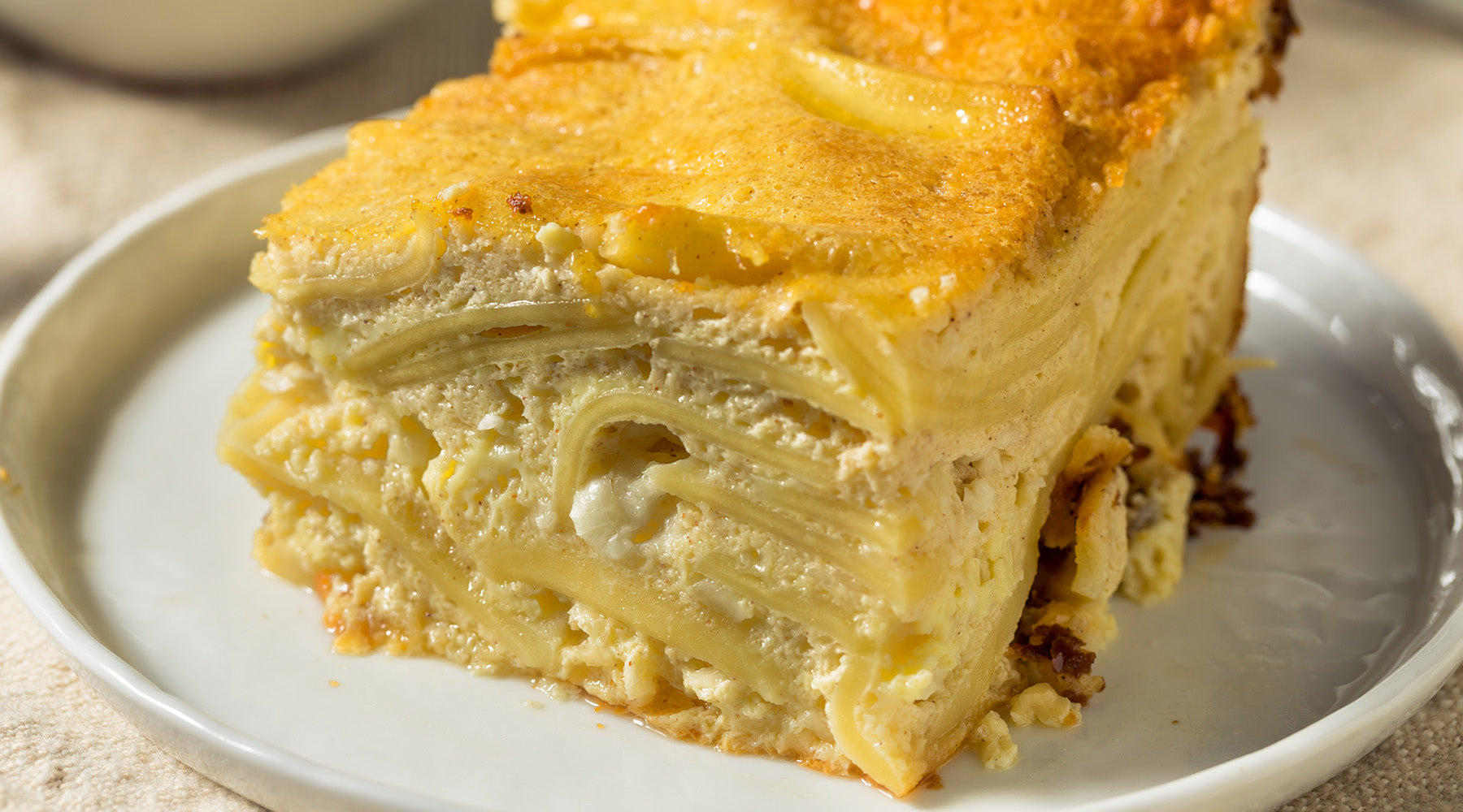 Hanukkah Noodle Kugel on a white plate