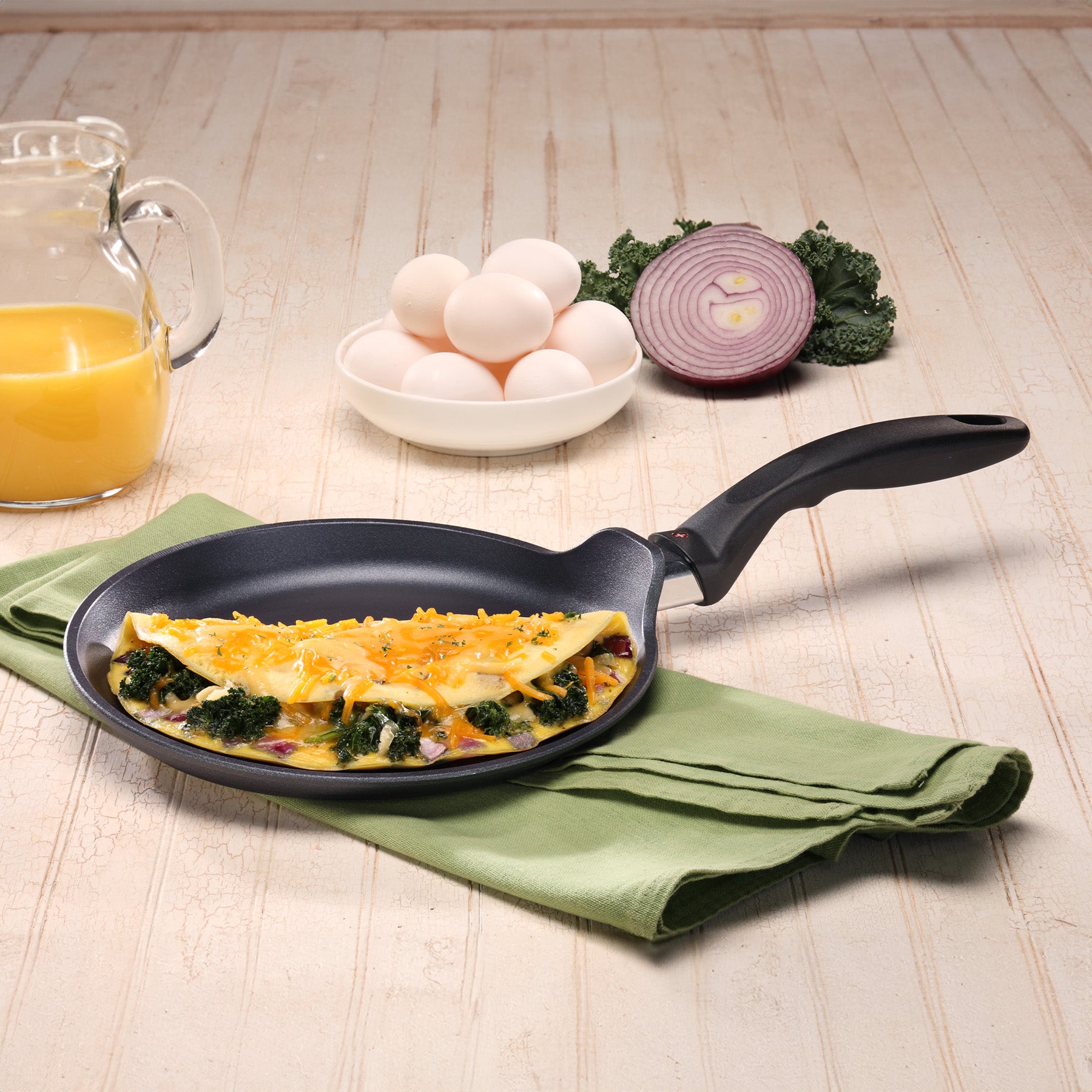 HD Nonstick Crepe Pan - Induction in use on dining room table