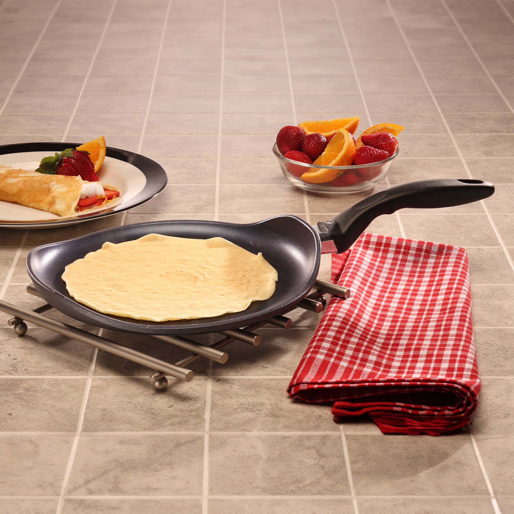 HD Nonstick Crepe Pan - Induction in use on dining room table