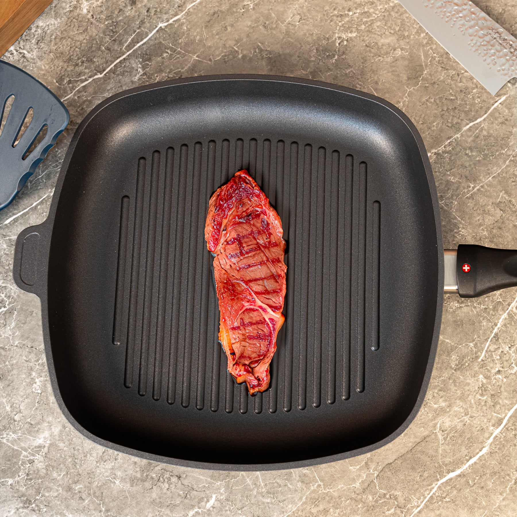 HD Nonstick 11" x 11" Square Grill Pan in use with meat on surface
