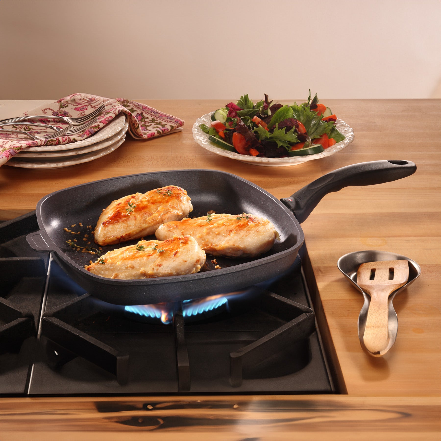 HD Nonstick 11" x 11" Square Fry Pan - Induction in use on kitchen gas stove top
