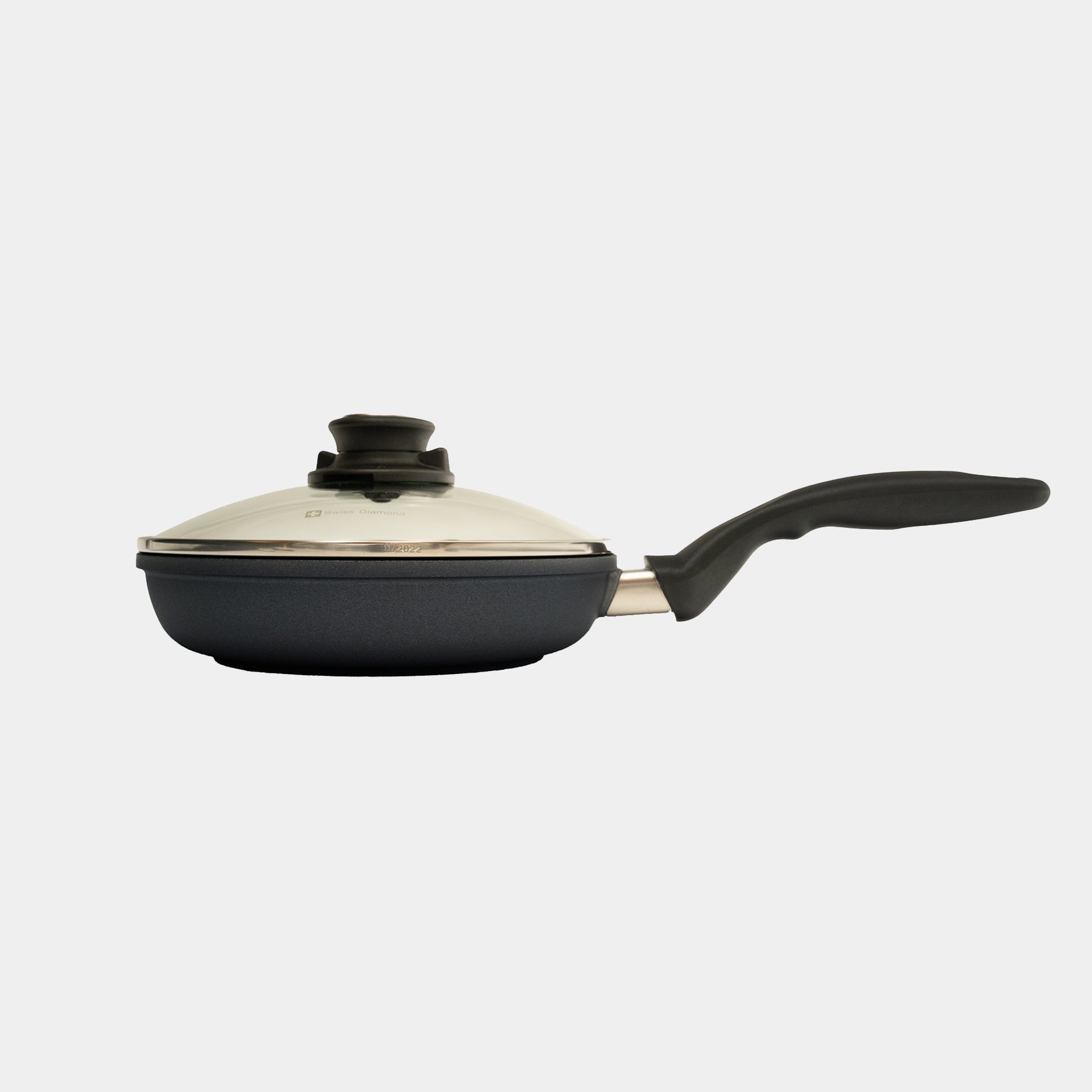 HD Nonstick Fry Pan with Glass Lid in use side view