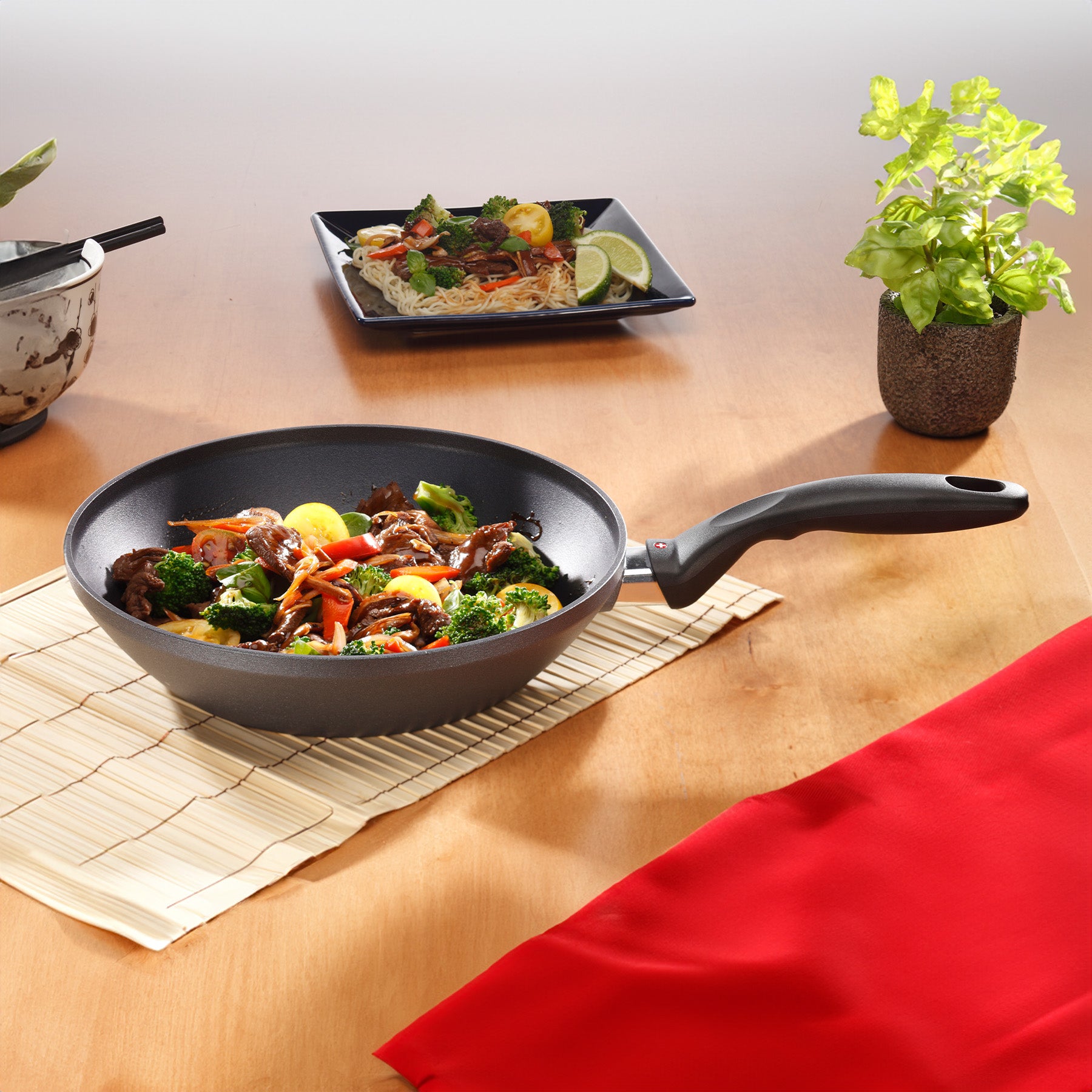 HD Nonstick Stir-Fry Pan with Glass Lid - Induction in use on dining room table