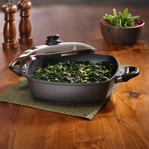 HD Nonstick 5 qt Square Casserole with Glass Lid in use on wooden table