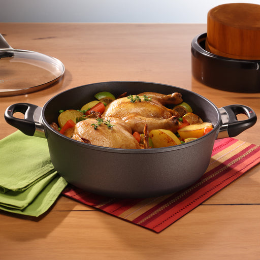 HD Nonstick Braiser with Glass Lid in use on wooden table