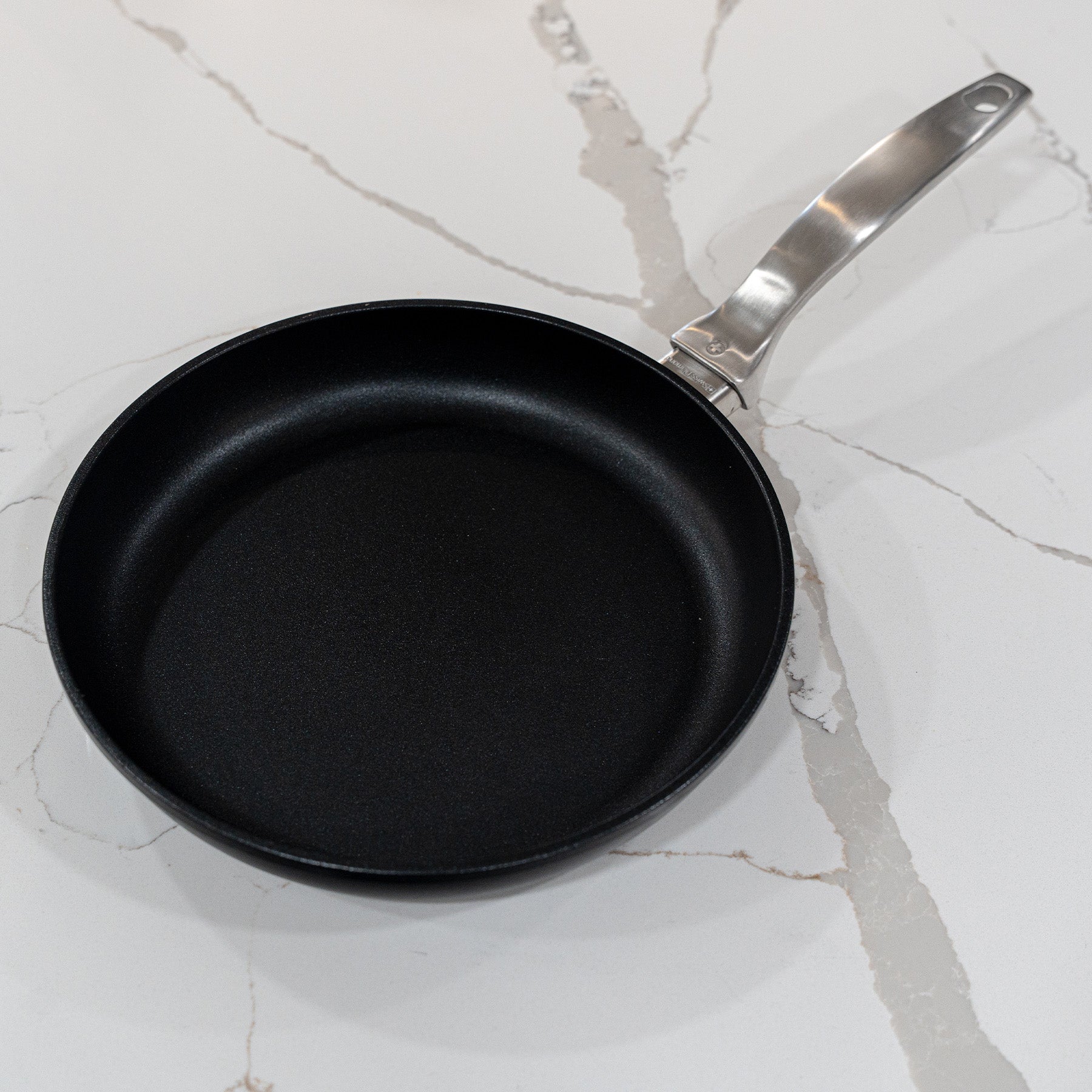 CHD Nonstick 9.5" Fry Pan on white marble kitchen counter