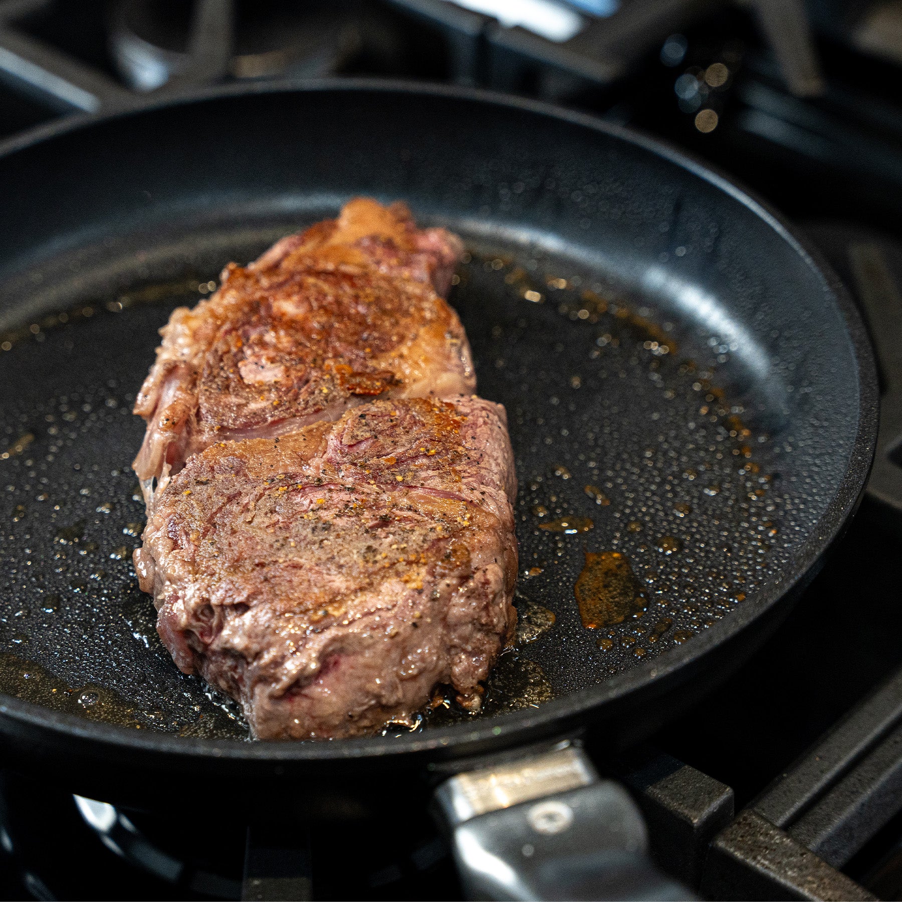 CHD Nonstick 10.25" Fry Pan on gas stove top with food inside