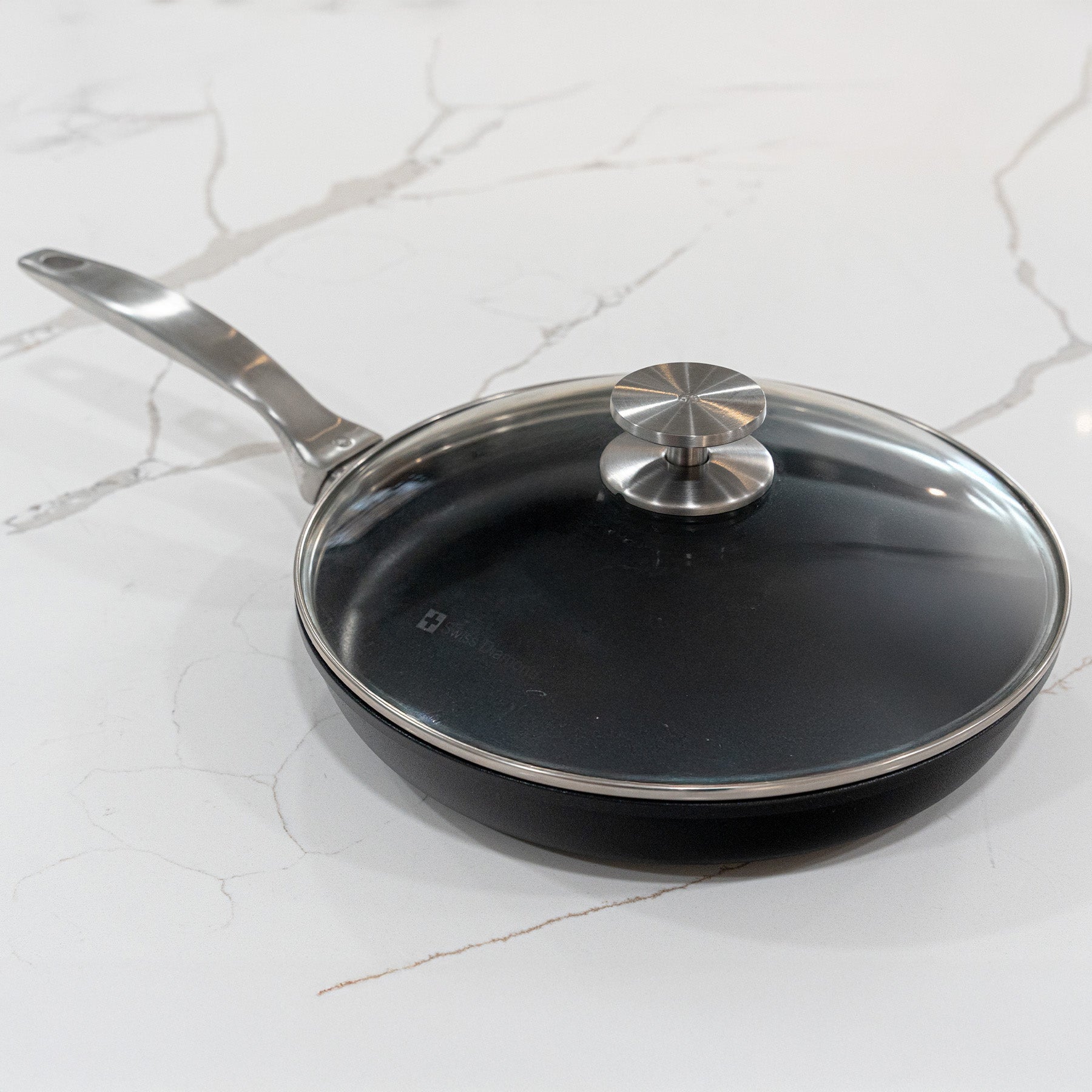 CHD Nonstick 10.25"" Fry Pan with Glass Lid on marble kitchen counter