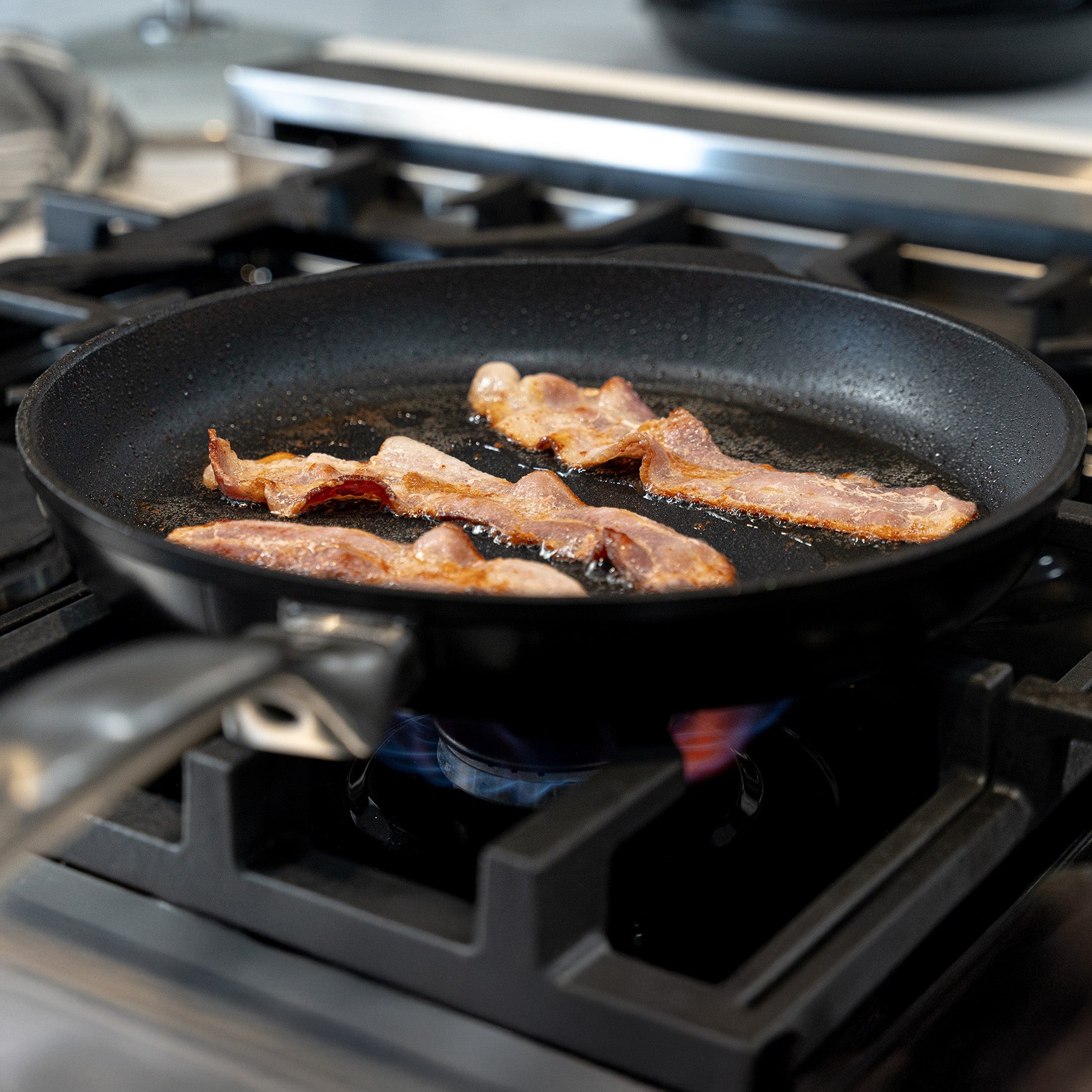 CHD Nonstick 11" Fry Pan on gas stove top with food inside