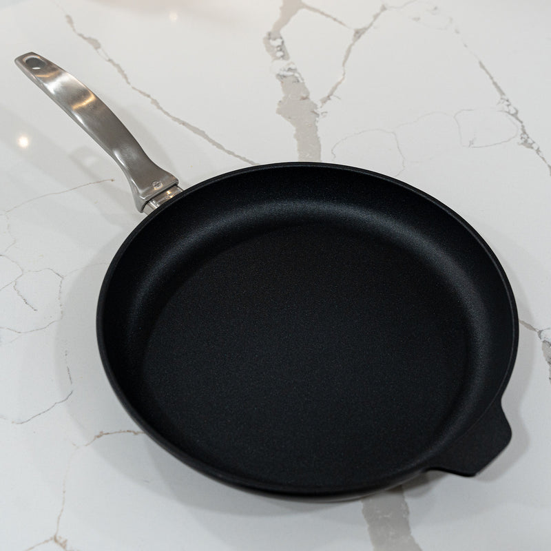 CHD Nonstick 11" Fry Pan on white marble kitchen counter