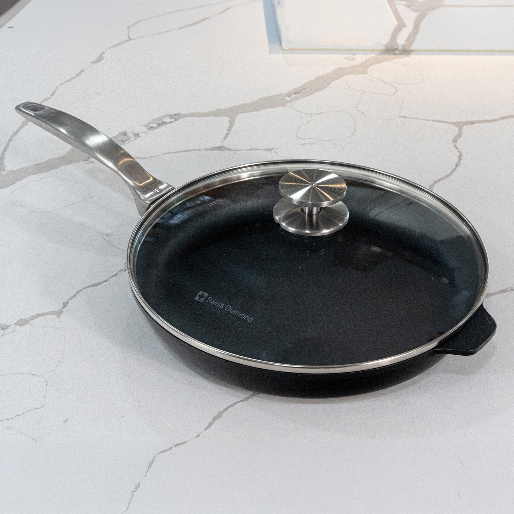 CHD Nonstick 11"" Fry Pan with Glass Lid on marble kitchen counter