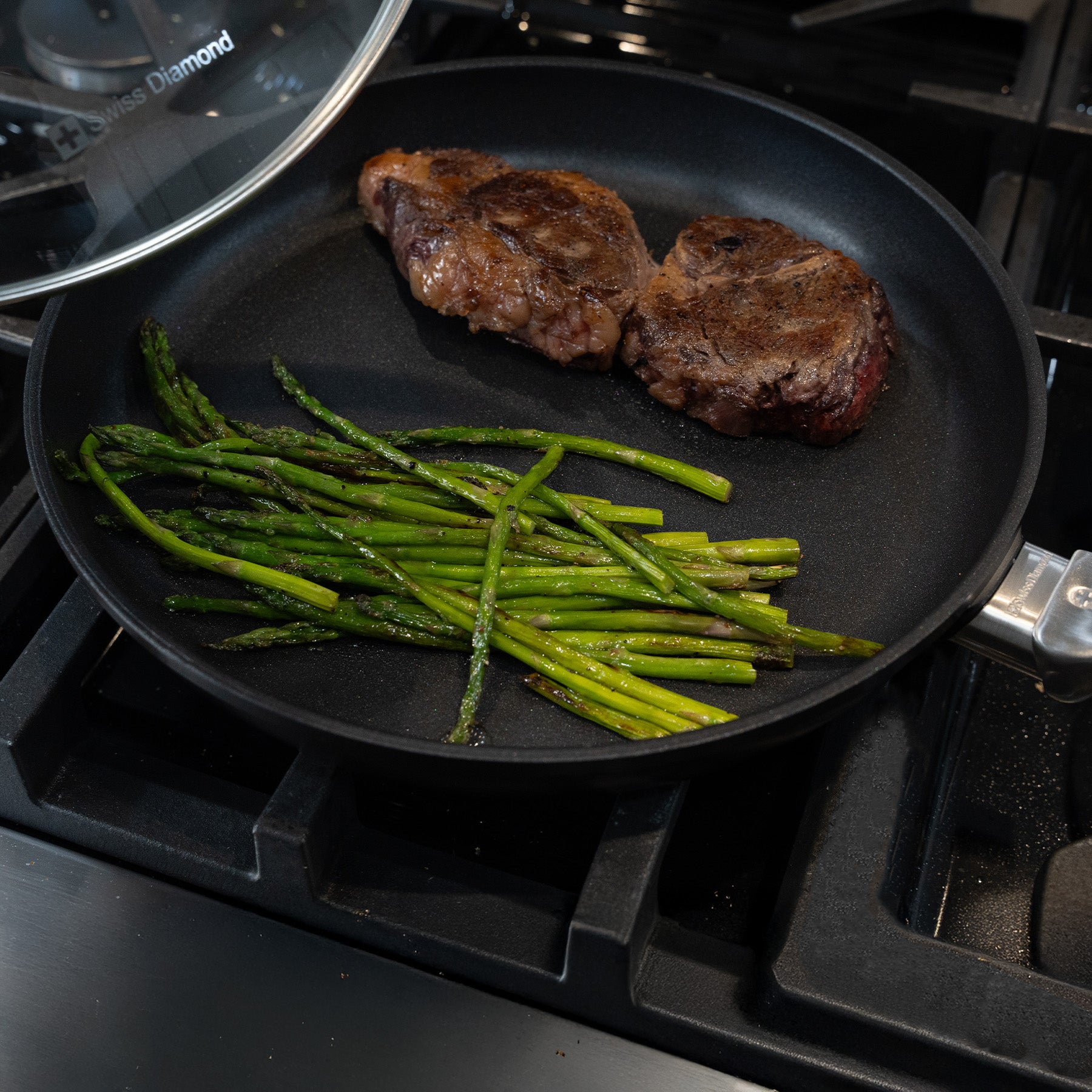 CHD Nonstick 11"" Fry Pan with Glass Lid on stove top with food inside