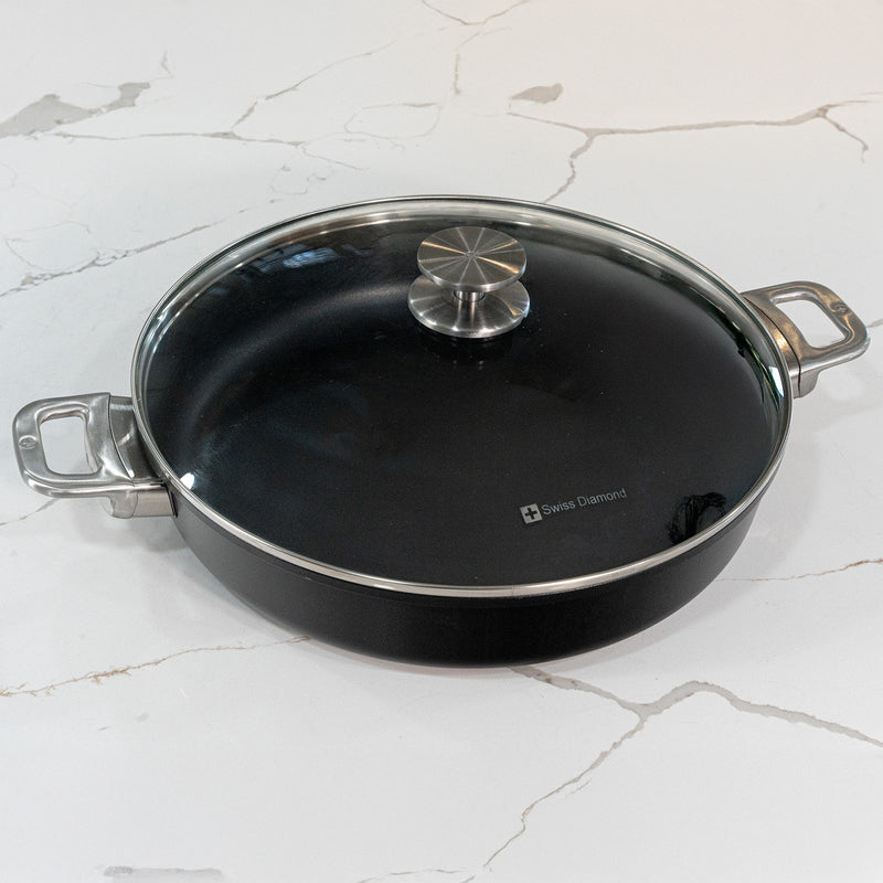 CHD Nonstick 4.8 qt Sauteuse with Glass Lid on marble kitchen counter