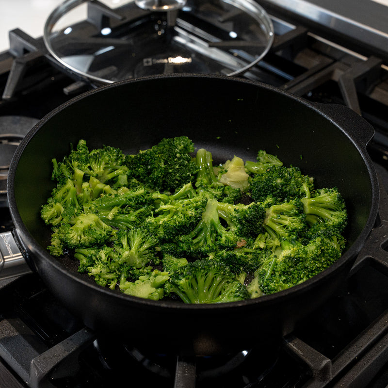 CHD Nonstick 3.8 qt Saute Pan with food inside on gas stove