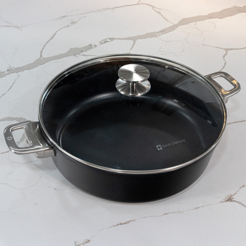 CHD Nonstick 7.2 qt Braiser with Glass Lid on white marble kitchen counter