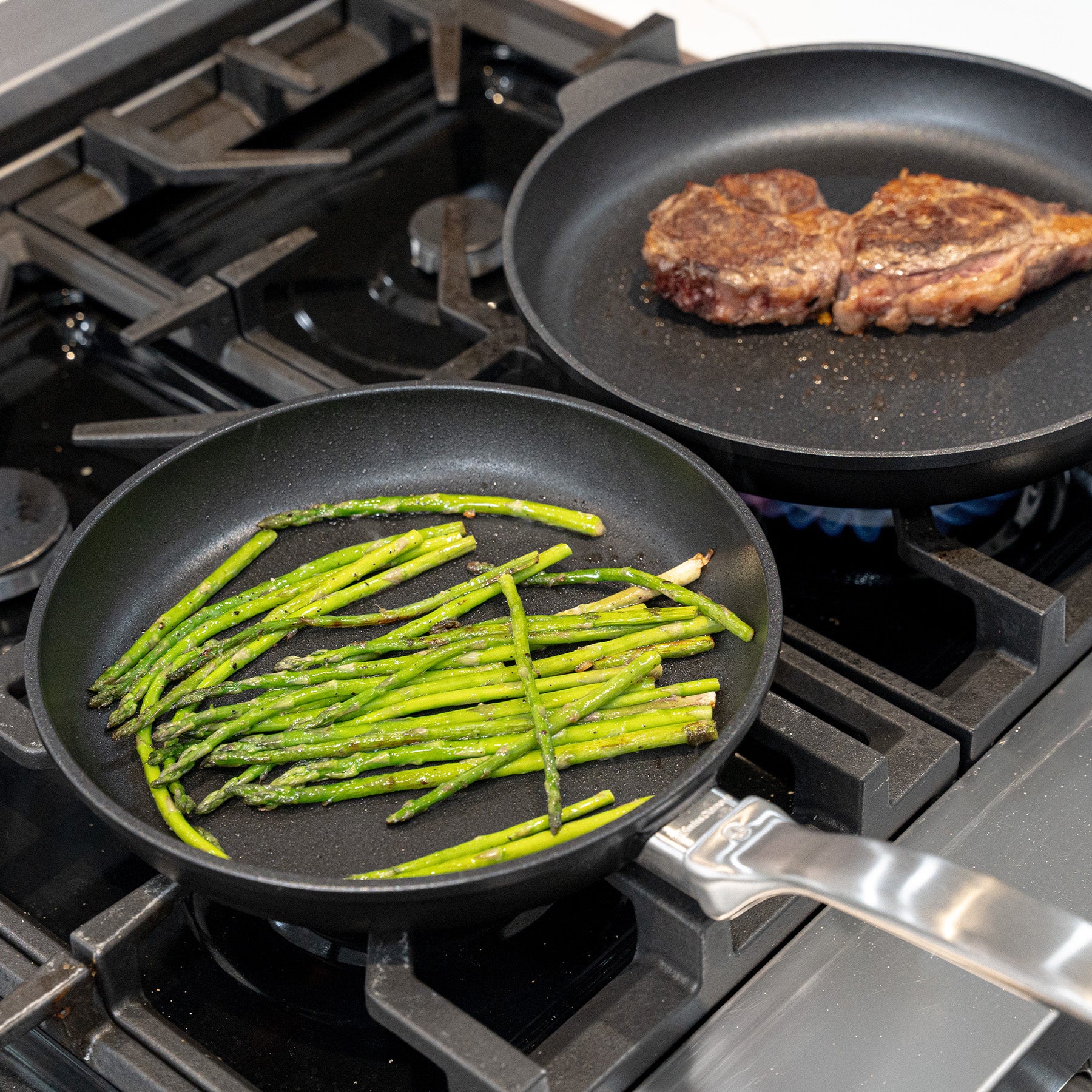 CHD Nonstick 9.5" & 11" 2-Piece Set - Fry Pan Duo on gas stove top with food inside