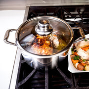 Premium Clad 6.3 qt Dutch Oven with Glass Lid - Induction in use on kitchen gas stove top