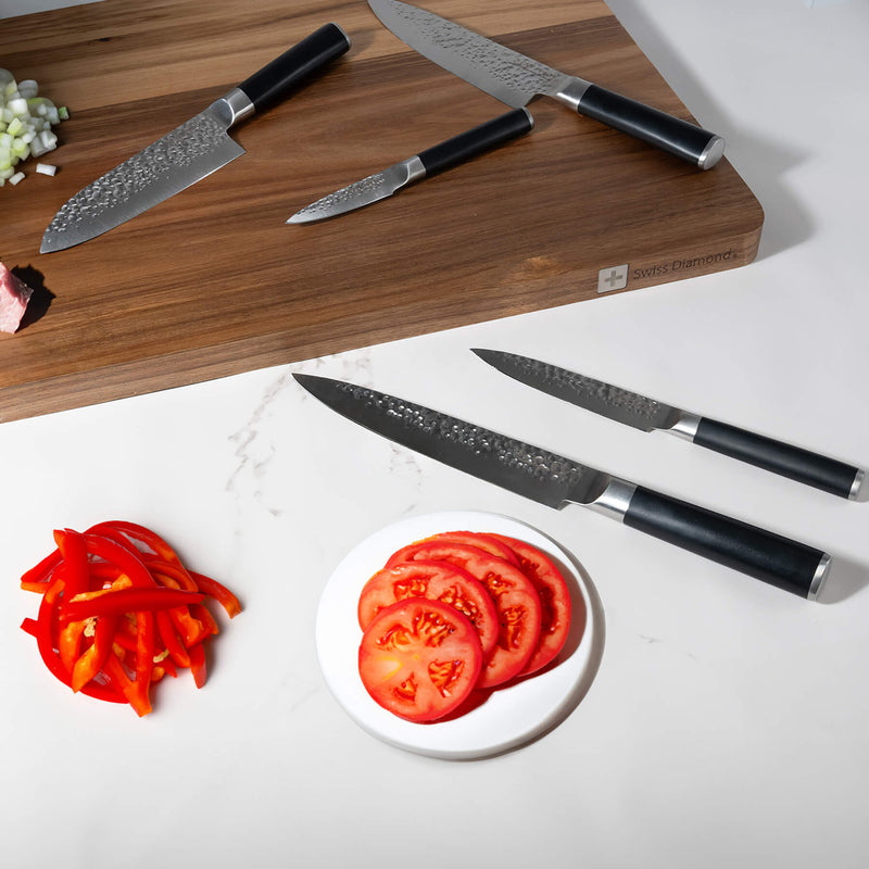 Hammered 5-Piece Knife Set on wooden cutting board on kitchen counter top with food