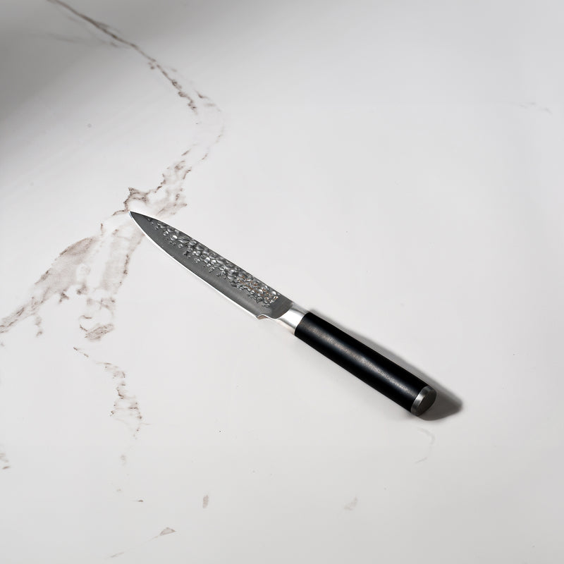 5" Hammered Utility Knife on kitchen marble white countertop