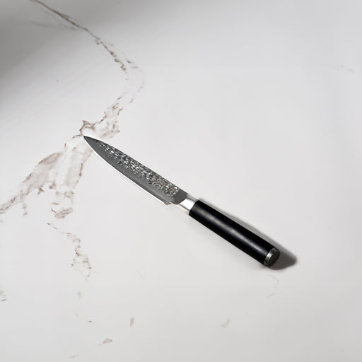 5" Hammered Utility Knife on kitchen marble white countertop