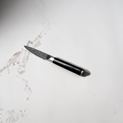 4" Hammered Paring Knife on kitchen white marble counter top