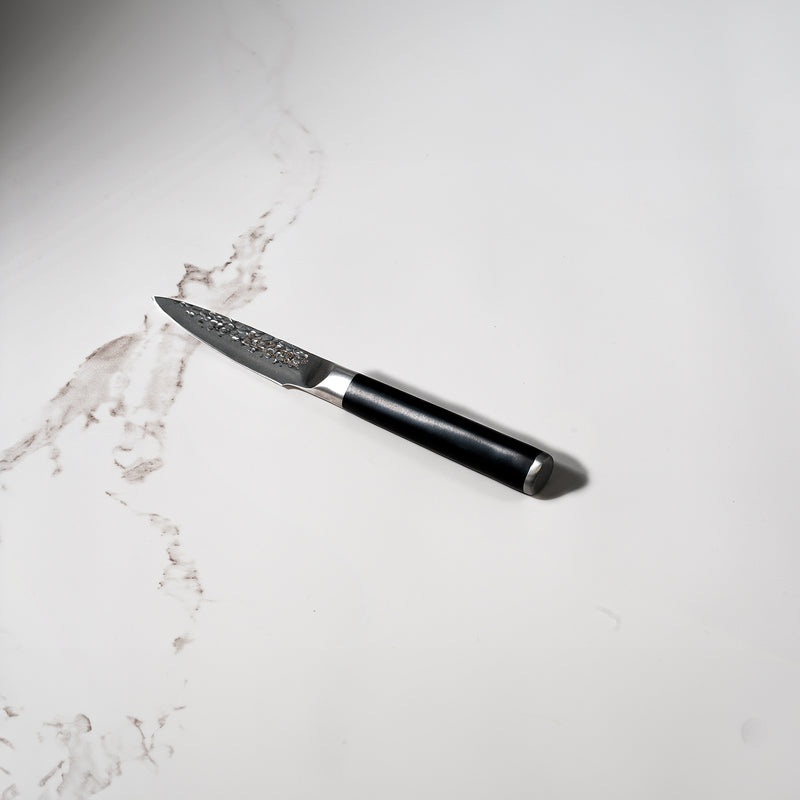 4" Hammered Paring Knife on kitchen white marble counter top
