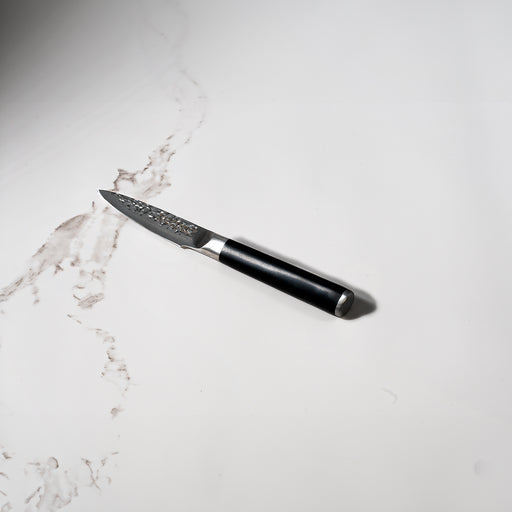 4" Hammered Paring Knife on kitchen white marble counter top