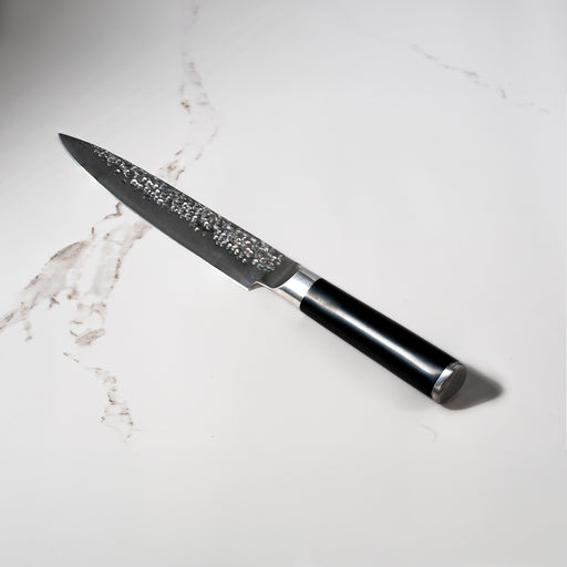 8" Hammered Carving Knife on Kitchen White Marble counter