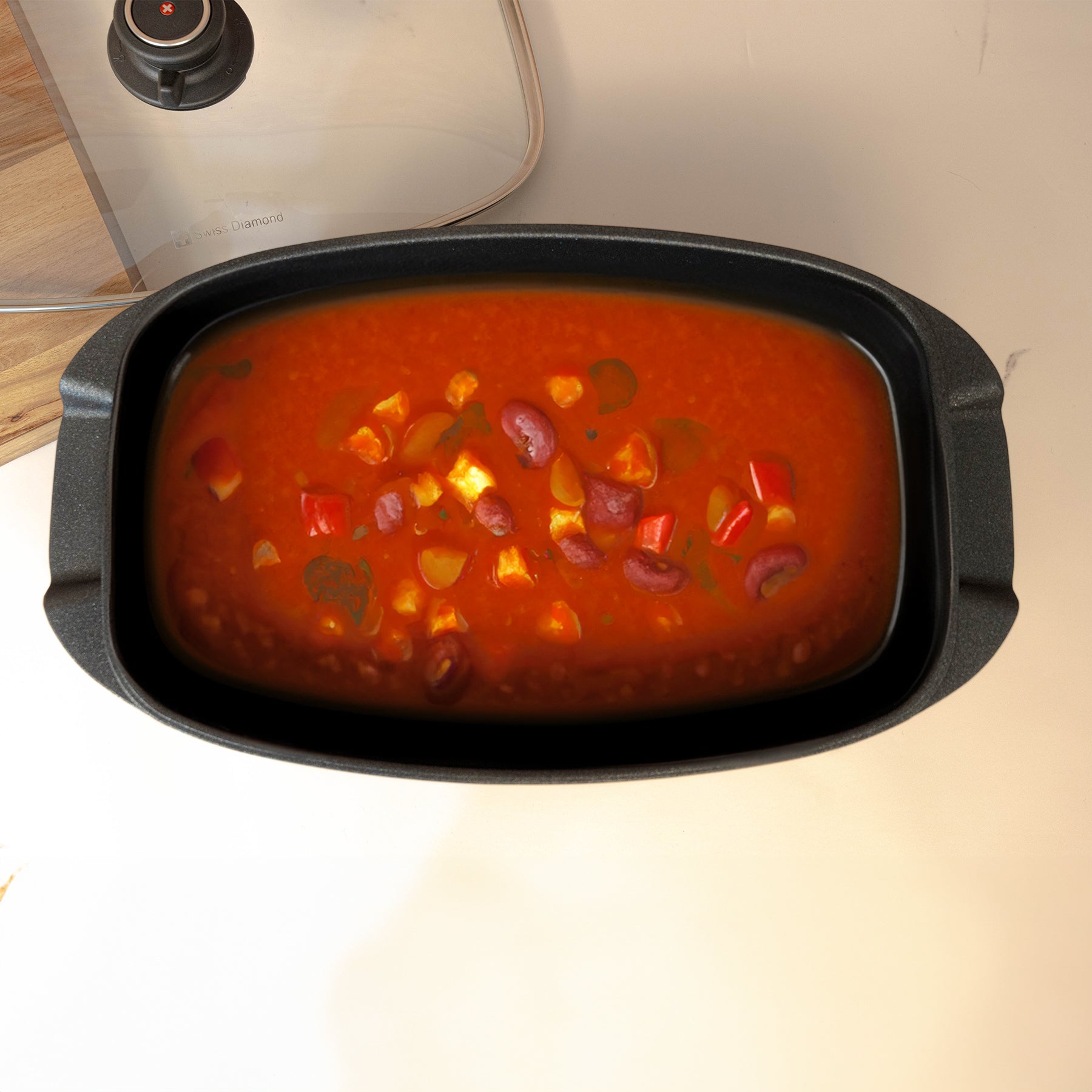 XD Nonstick 5.3 qt Roaster with Glass Lid with food inside