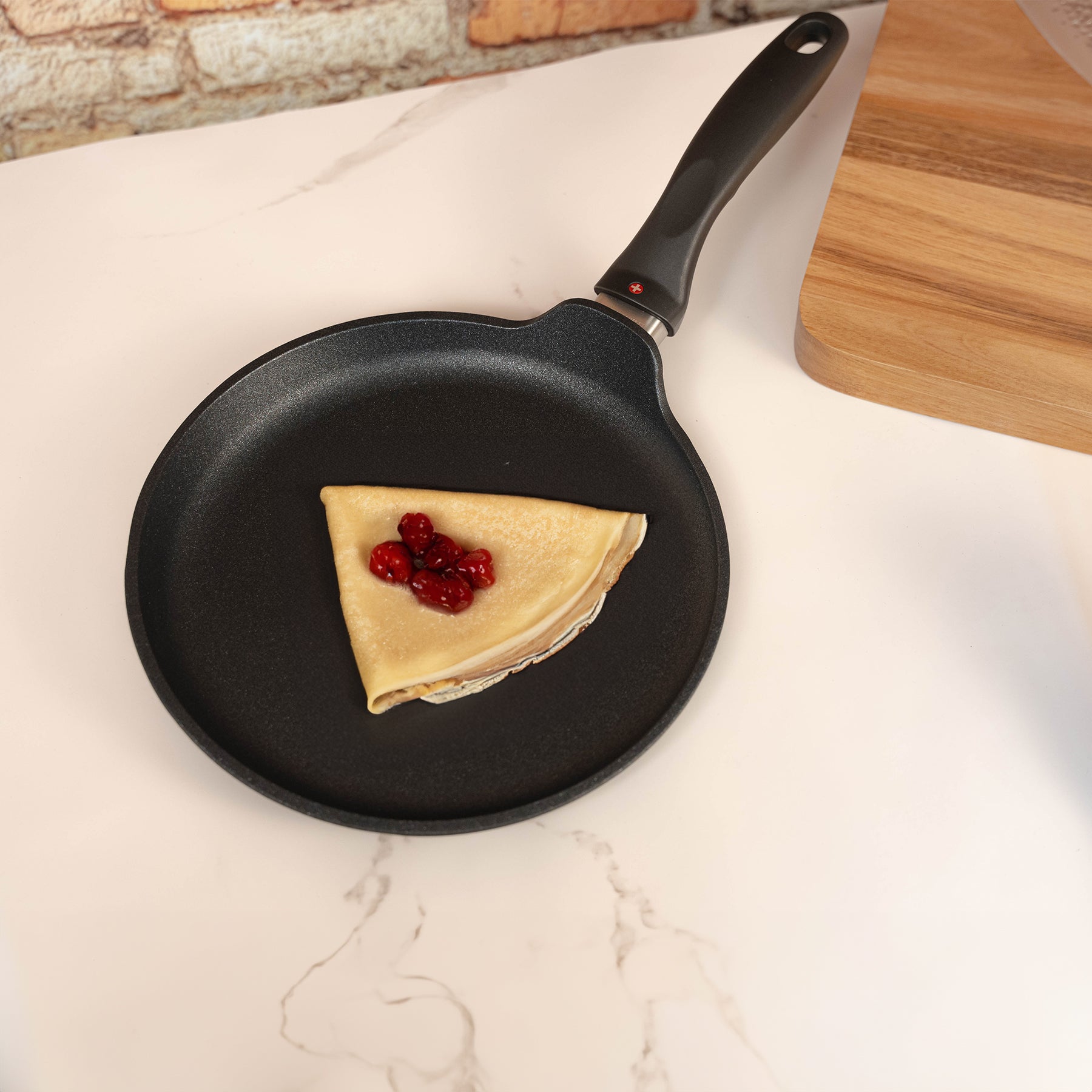 XD Nonstick Crepe Pan - Induction in use with food on surface