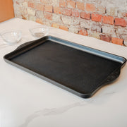 XD Nonstick 17" x 11" Double-Burner Griddle in use on white counter top