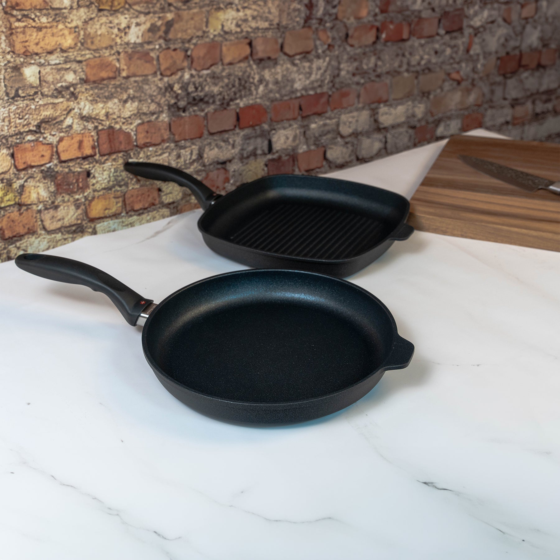 XD Nonstick 2-Piece Set - Fry Pan & Grill Pan in use on kitchen counter side view