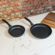 XD Nonstick 2-Piece Fry Pan Set - Induction on kitchen counter angled side view