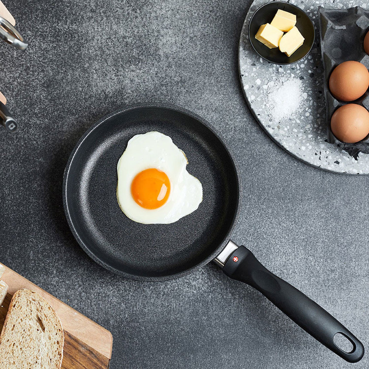 xd fry pan in use with a sunny side egg on a counter